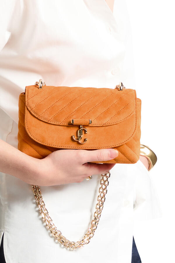 Curve Quilted Crossbody Bag