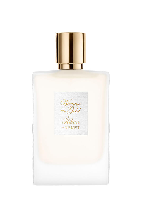 Woman In Gold Hair Mist