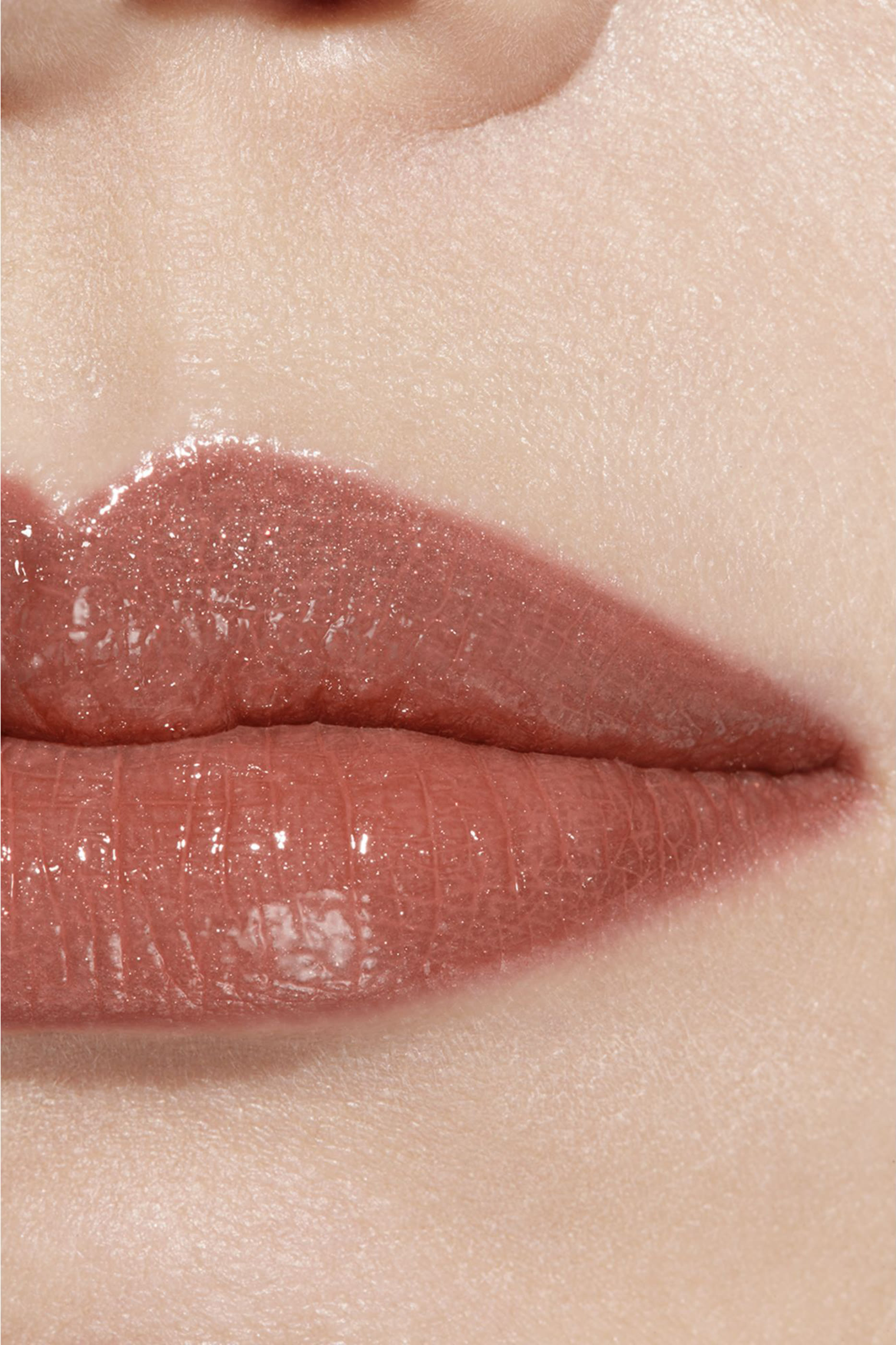 Chanel Rouge Coco Baume Shine Hydrating Beautifying Tinted Lip Balm